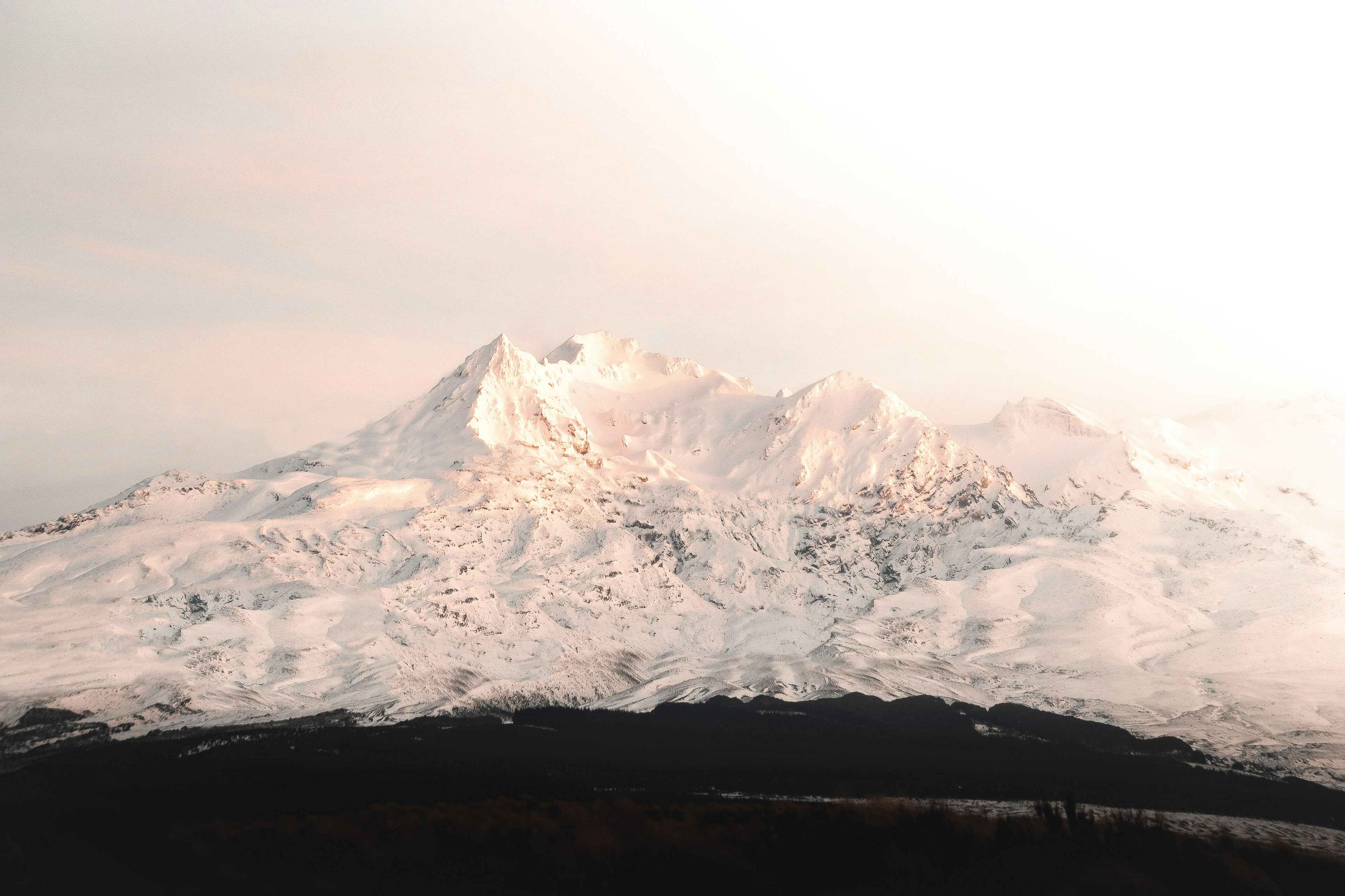 snow covered mountain during daytime